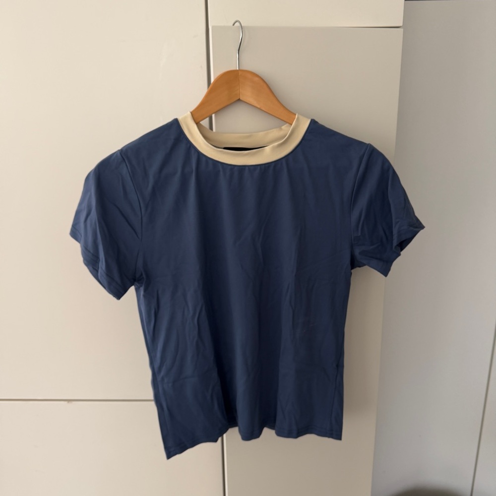Lioness Navy Blue Tee with Cream Trim